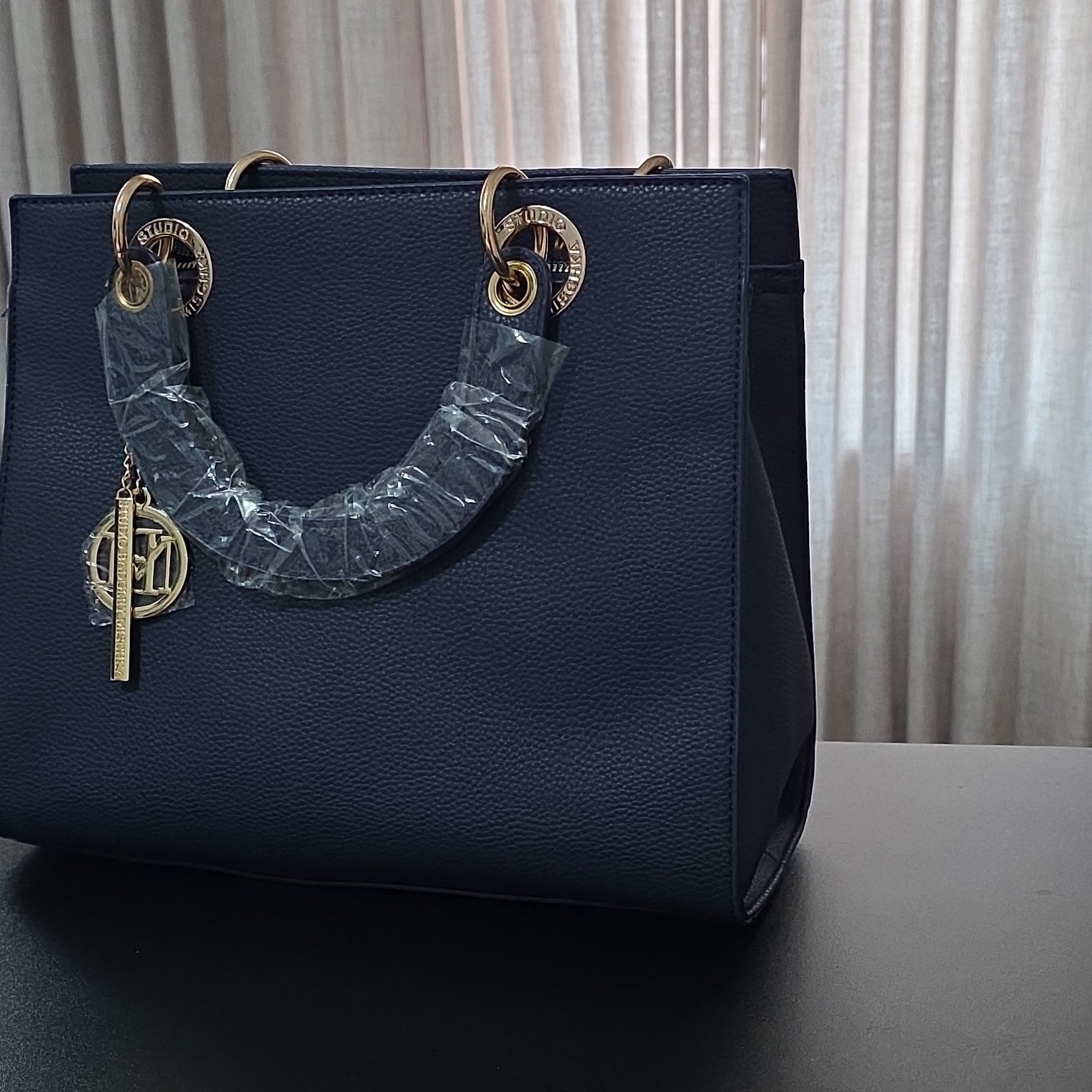 Badgley Mischka Navy Pebbled Top Handle Bag Gold Hardware Logo Bag Charm